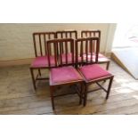 Five oak dining chairs