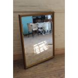 A bevelled edge mirror,