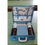 A vintage Brexton picnic set in blue case