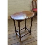 A 1930's oak barley twist occasional table