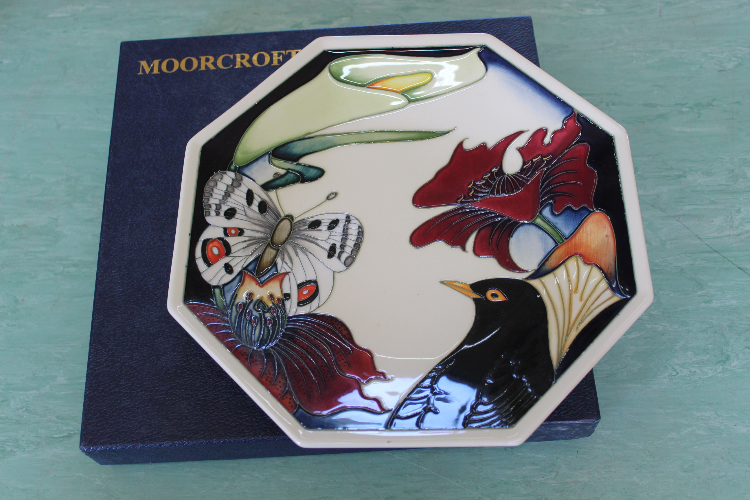 A boxed Moorcroft 'Designers Medley' octagonal plate,