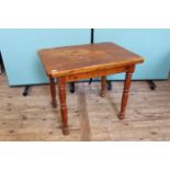 A small pine kitchen table
