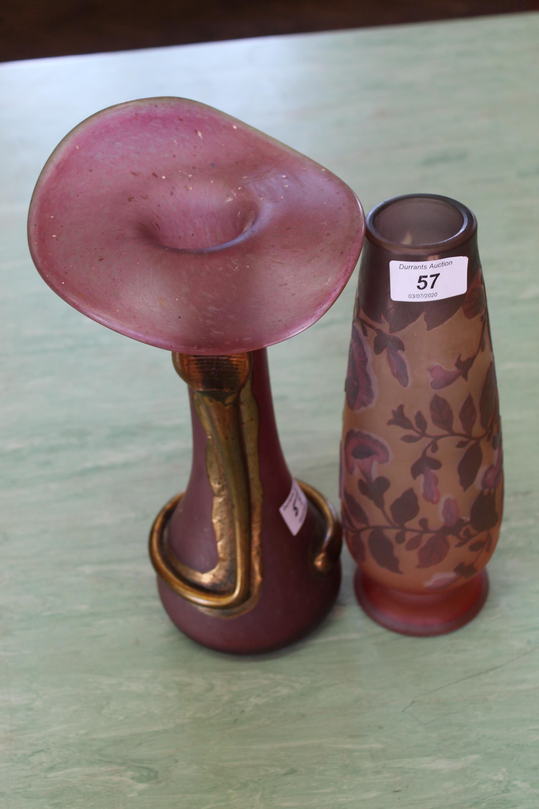 A French cameo glass vase amber ground overlaid with pink petunias, signed Galle,