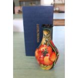 A boxed Moorcroft 'Allegro Flame' vase (2003),