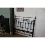 A Victorian 4'6" brass and iron bed with side rails (as found)