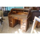 An Edwardian oak roll top desk (tambour as found)