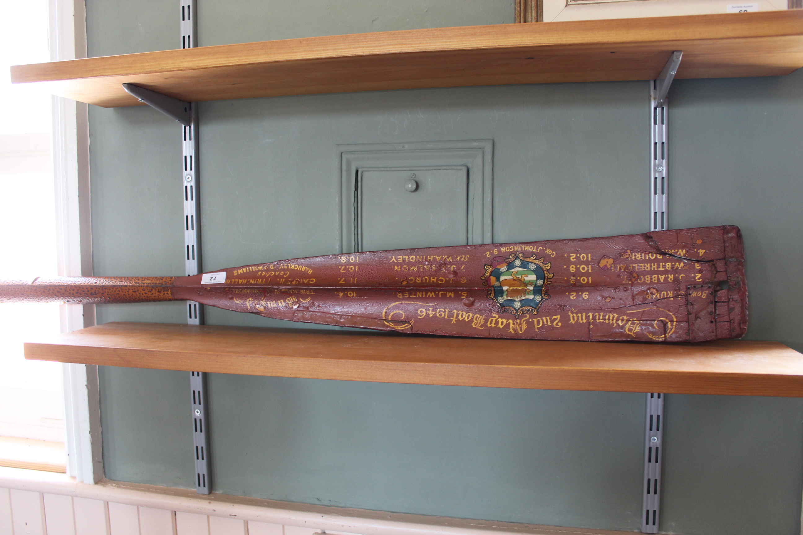 A 12 feet wooden oar, the painted blade: 'Downing 2nd May Boat 1946' and crest,