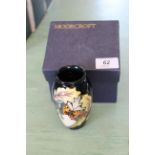 A boxed Moorcroft 'Avalon' vase,