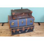 Two vintage trunks and an suitcase