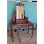 A late Victorian stained pine dressing table