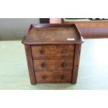 A late Victorian burr walnut bank of three drawers,