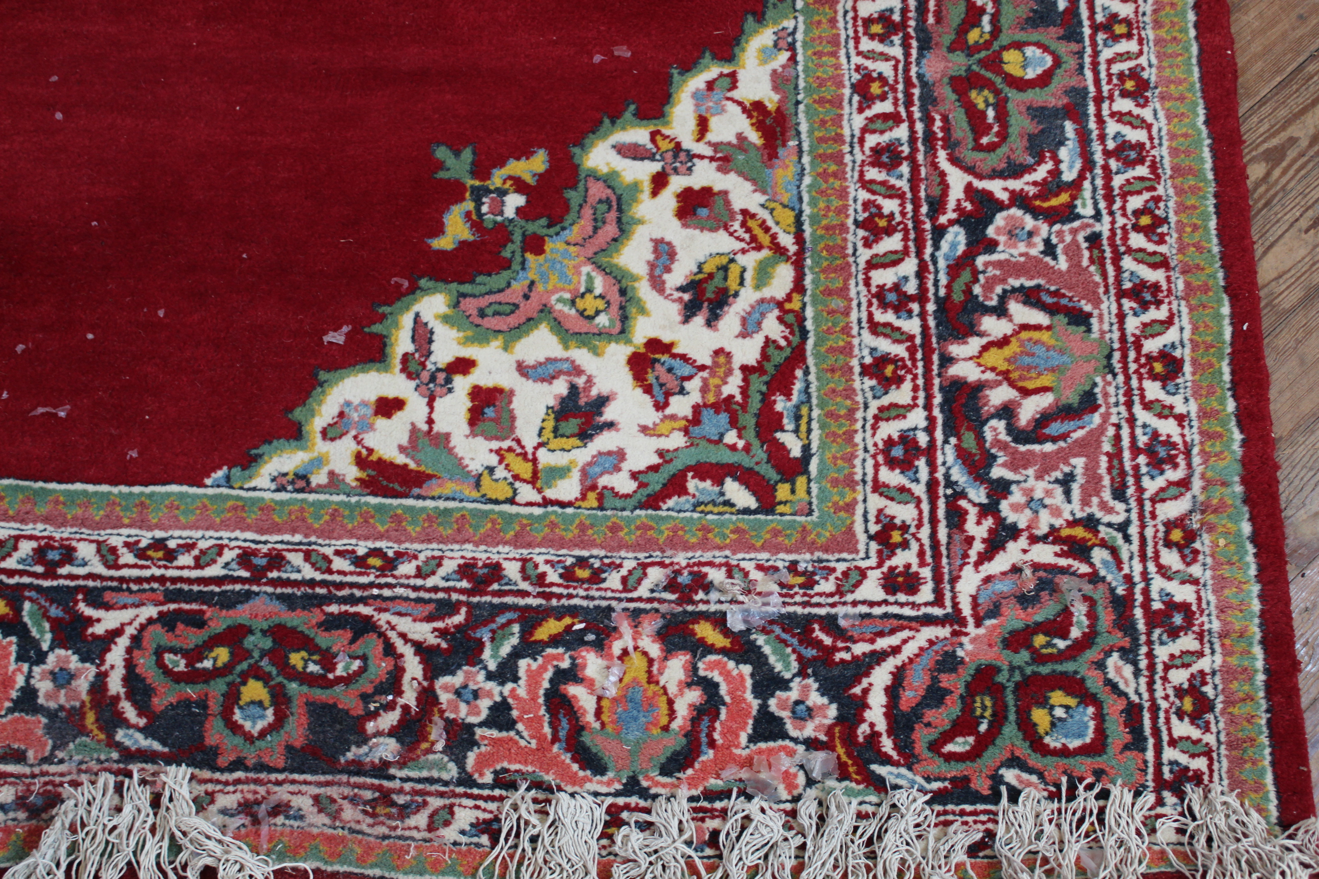 A Chinese red ground wool carpet with central medallion 104" x 146" - Image 2 of 3