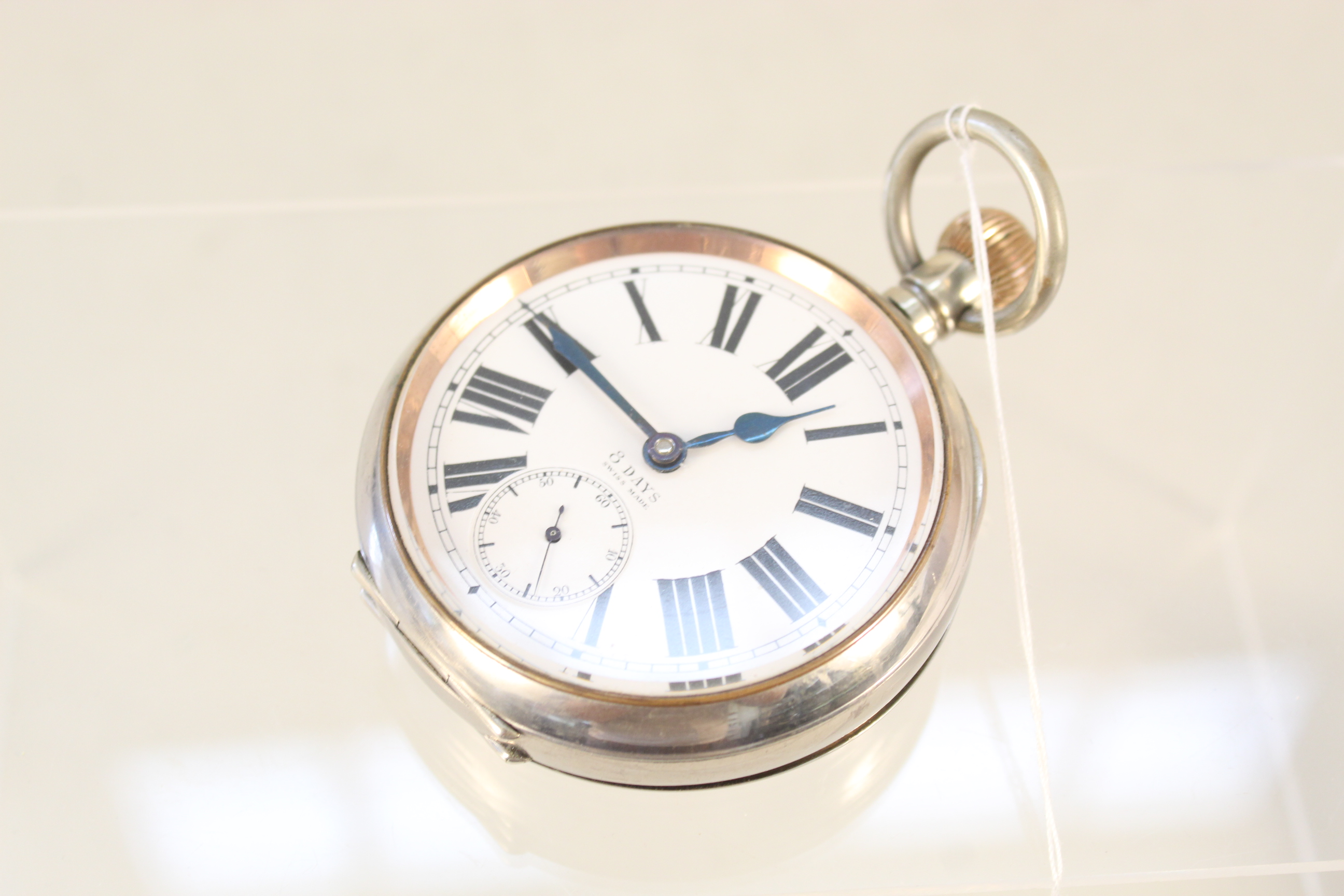 An 8 day nickel plated Goliath pocket watch - Image 5 of 5