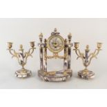 A late 19th Century French onyx and gilded brass clock garniture