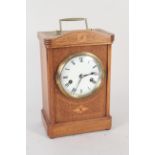 A late 19th Century inlaid oak cased carriage style 8 day clock