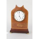 A 19th Century mahogany cased John Walker Ltd mantel clock, brass feet with musical inlay to front,