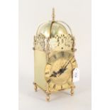 A good quality reproduction brass lantern clock