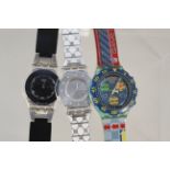 Three assorted Swatch quartz wristwatches