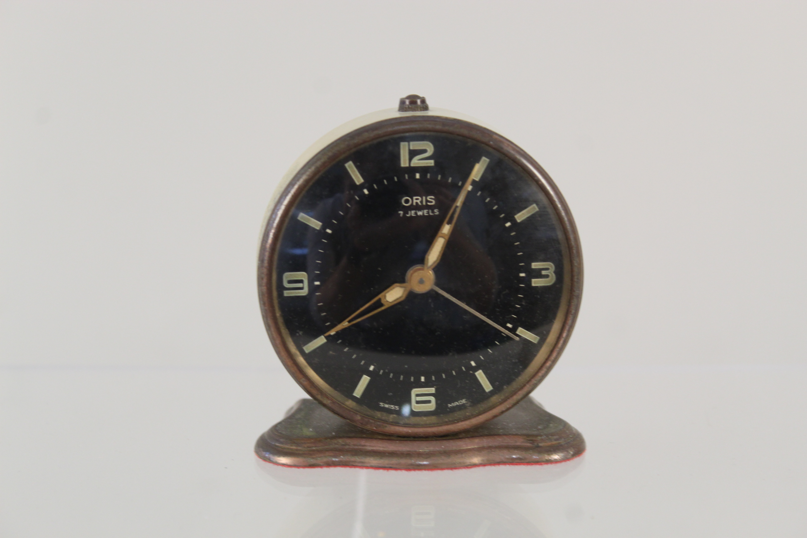 An Oris vintage 7 jewel desk alarm clock