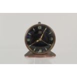 An Oris vintage 7 jewel desk alarm clock