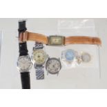 Six assorted wristwatches including two Mickey Mouse watch heads