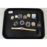 Twelve assorted watch heads including Smiths,