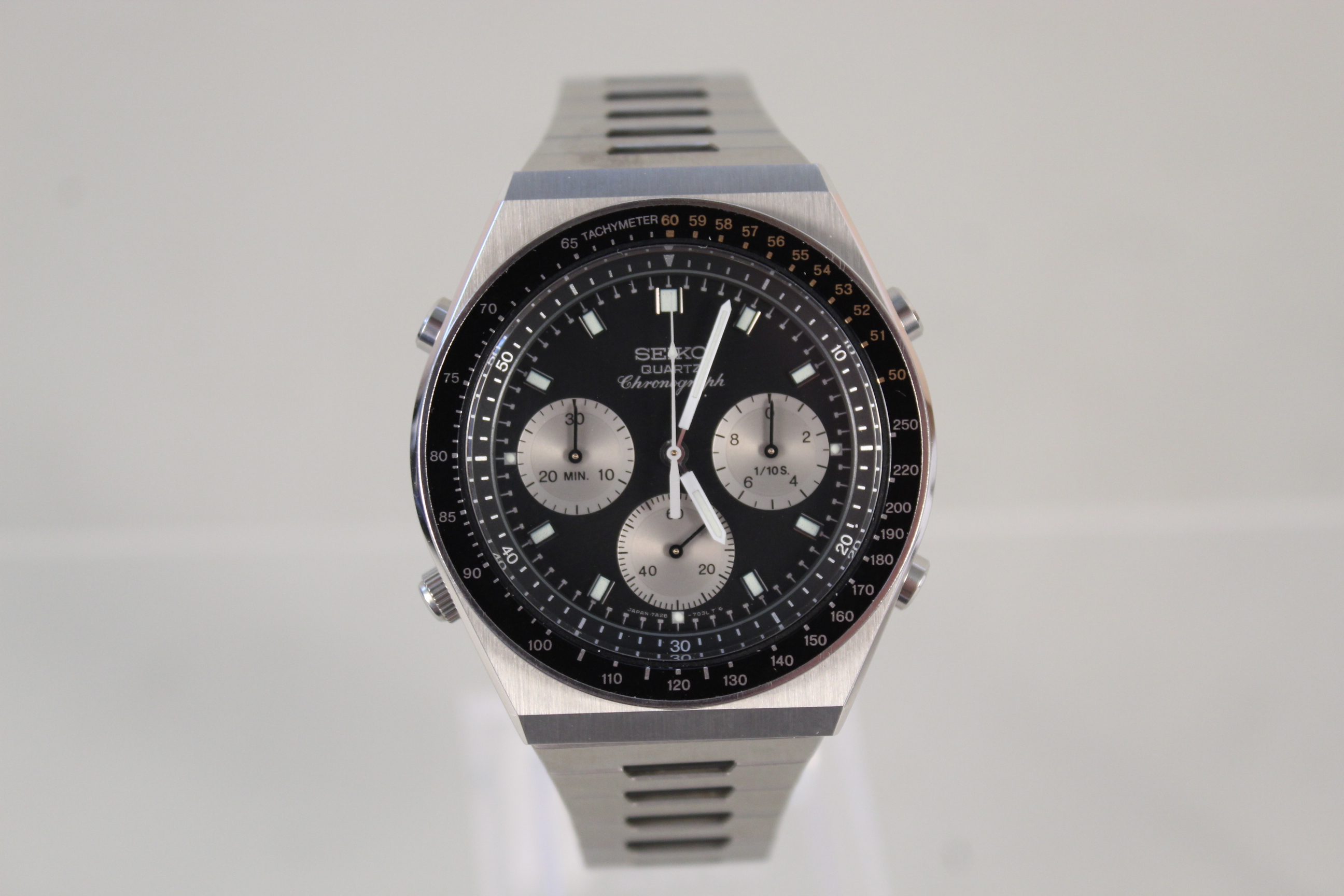 A Seiko quartz chronograph watch, 7A28-703B numbers,