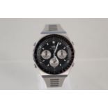 A Seiko quartz chronograph watch, 7A28-703B numbers,