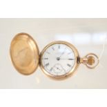 A gold plated Waltham pocket watch,