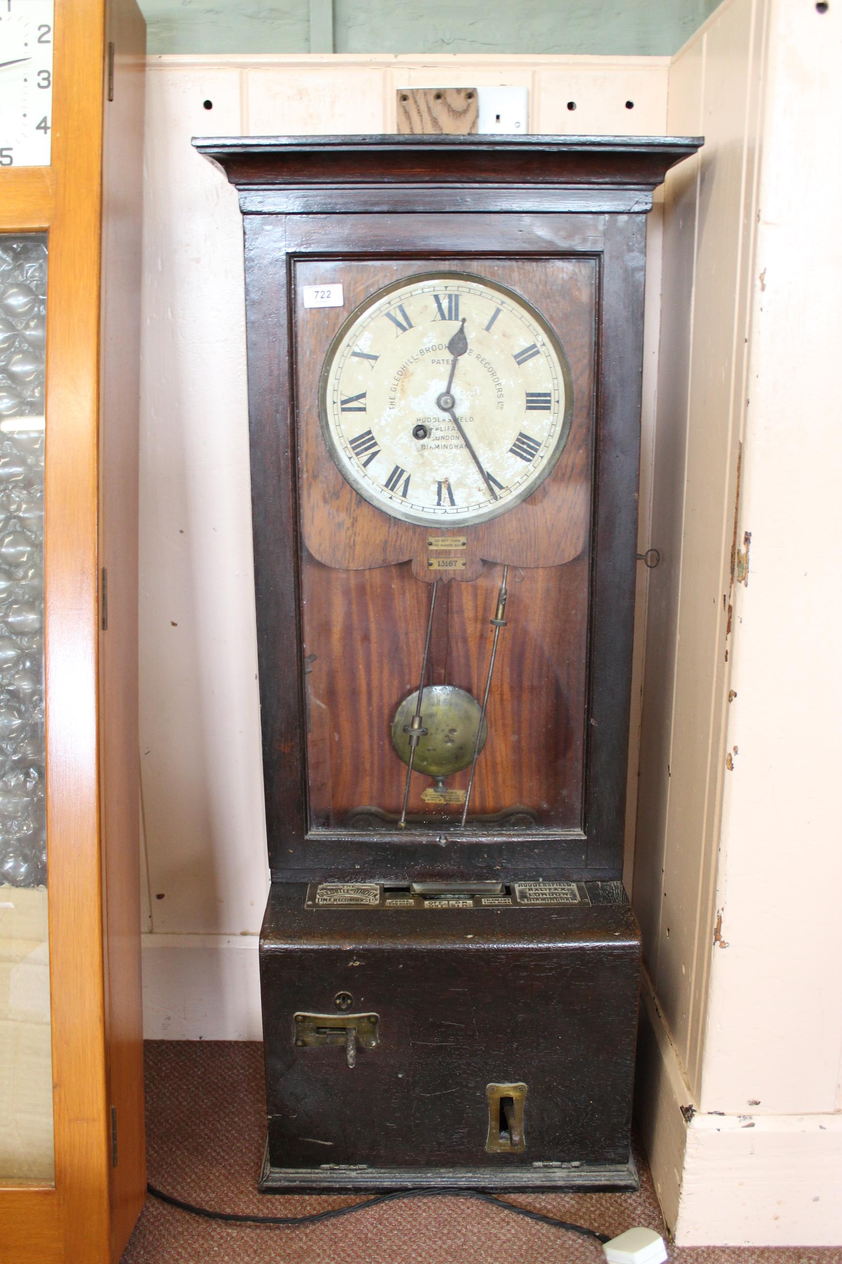 An oak cased clocking in machine 'The Glenhill-Brook' by Time Recorders Ltd