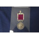 A QEII Long Service and Good Conduct medal with regular Army bar to 22790784 W.O.CL.2. J.E.J.Seales.