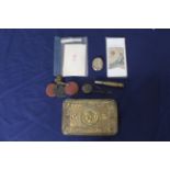 A Queen Mary 1914 gift tin with correct Christmas card and other WWI related items