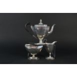 A silver three piece tea set, Sheffield 1919/1924, maker Thomas Bradbury & Sons,
