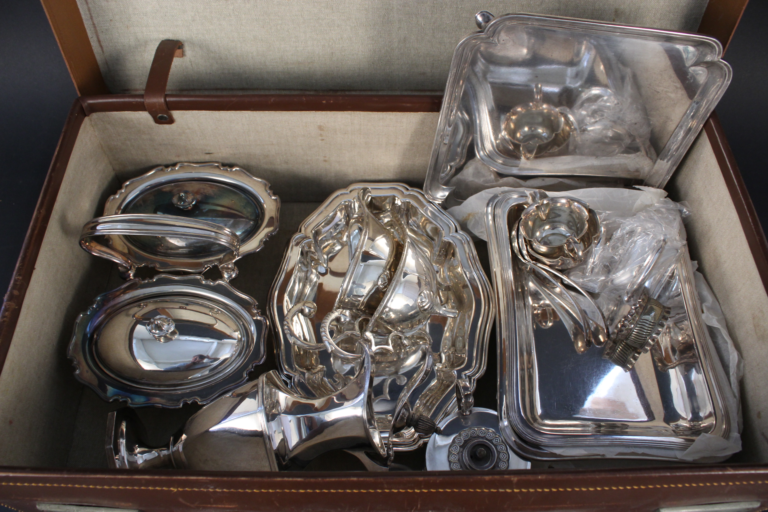 A quantity of silver plated items including entree dishes,