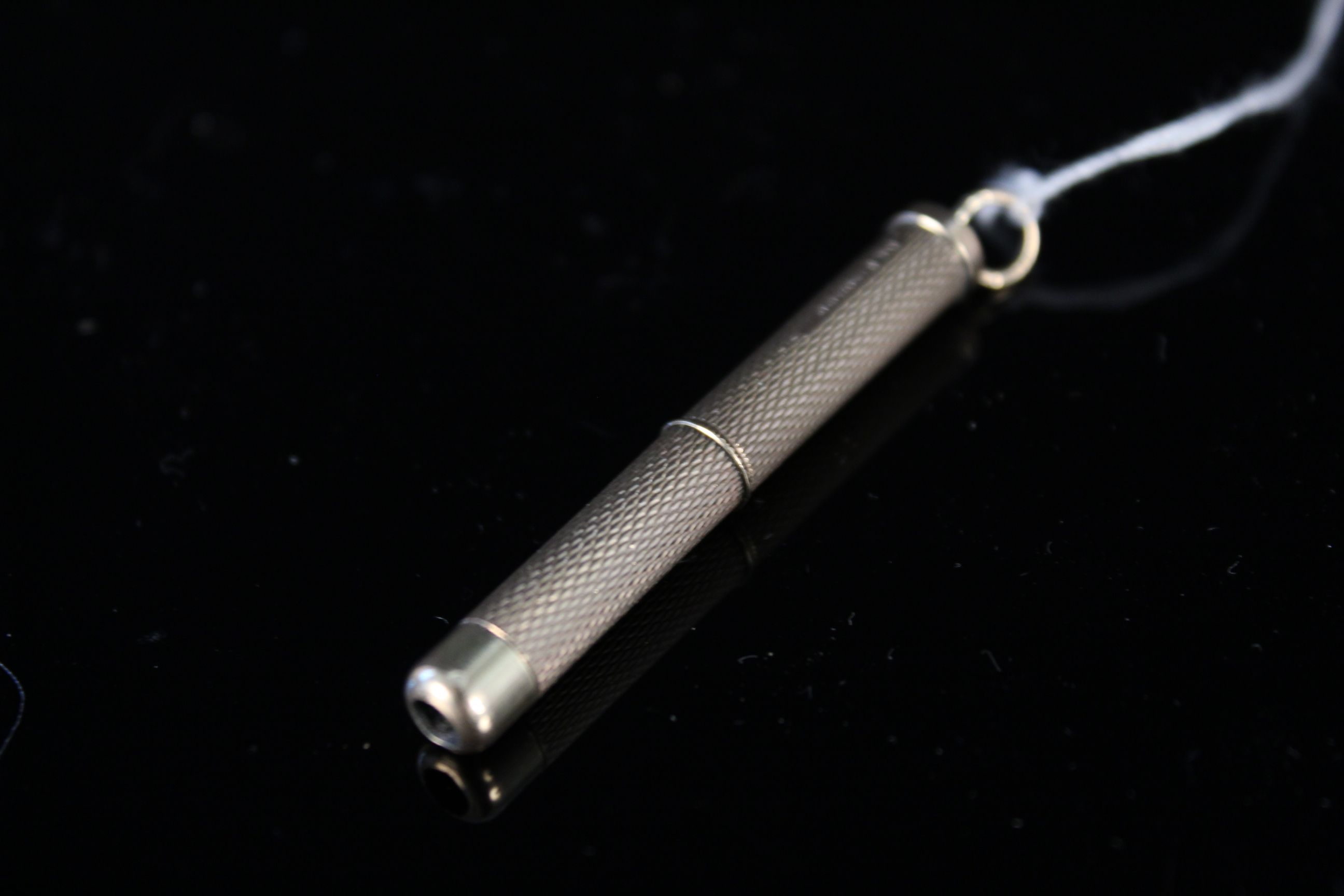 A 9ct gold cigar piercer in case, maker D & F, - Image 2 of 3