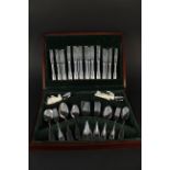 A wooden cased canteen of silver plated cutlery by Guy Degrenne, France,