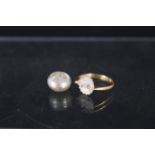 A French 18ct gold single pearl ring (pearl is loose),
