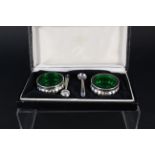 A pair of Argentina silver salts with green glass liners, signed Wright Soc.