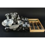 A quantity of silver plated items including a three piece tea set,