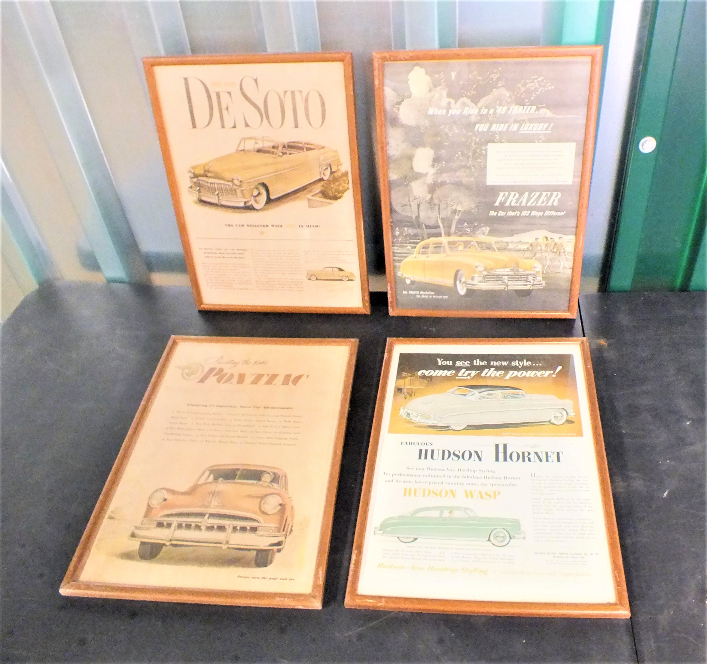 Four small framed posters including of vintage cars including De Sota, Hudson Hornet,