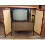 A vintage Decca TV in striking stylish cabinet.