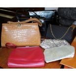 A collection of twelve vintage and retro style purses and handbags including a mock crocodile