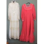 A 1970's high neck full length wedding dress and a 1970's pink and white bridesmaid's dress a