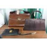 Two vintage handbags (one in mock lizard skin) and a black leather clutch bag