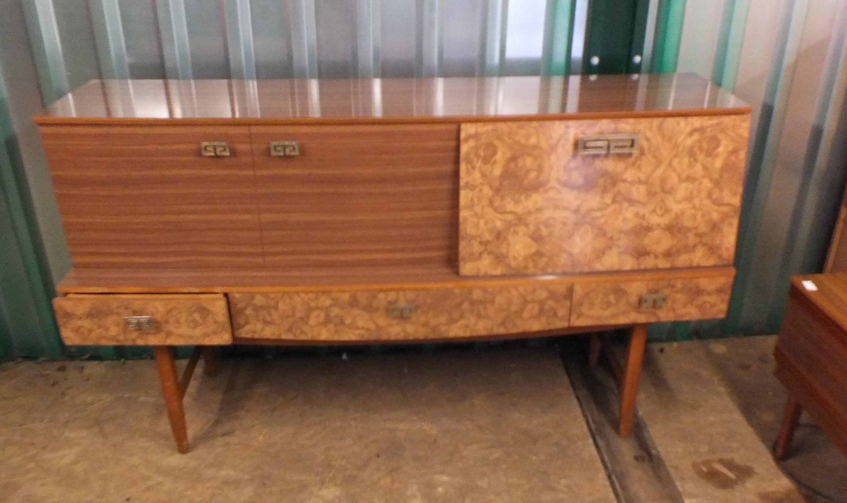 A 1960's sideboard/cocktail cabinet with mock burr walnut panels, folding doors, - Image 2 of 2