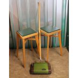Two 1960's kitchen stools marked made in Yugoslavia with a green melamine top kitchen table and a