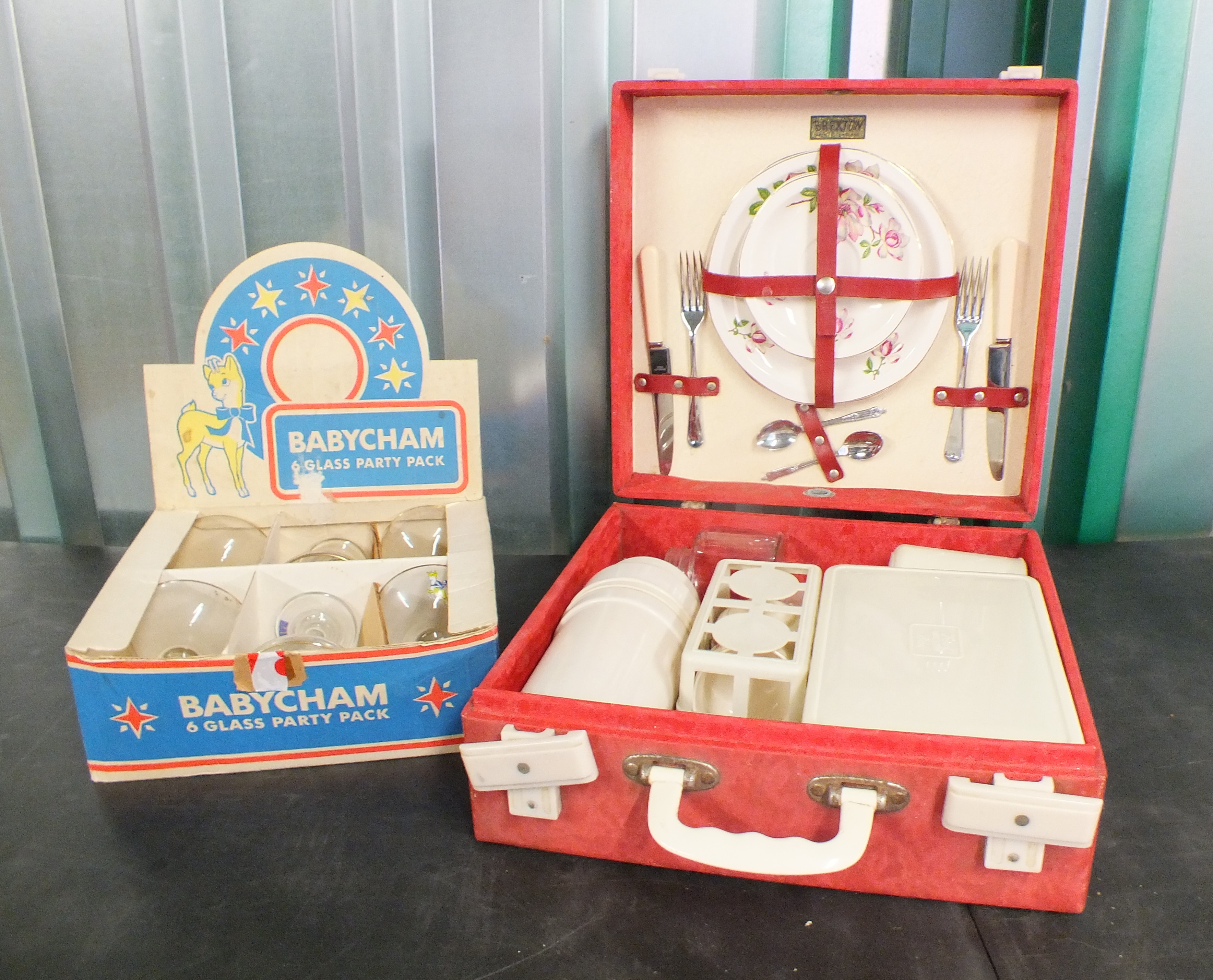 A vintage red case picnic set and a set of six Babysham glasses in original presentation box