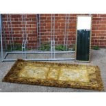 A Norsk "Made in England" shaggy rug and a rectangular gilt framed mirror