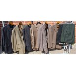 Various vintage men's clothing items including three men's jackets, two suits,