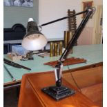 A black 1940's Hebert Terry anglepoise lamp.